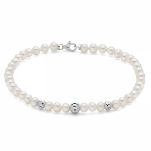 Bracciale di perle Oriente con tre sfere in oro bianco intagliate